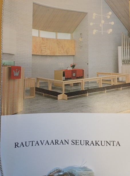 Rautavaaran seurakunnan adressi, kannessa kuva kirkon alttarista
